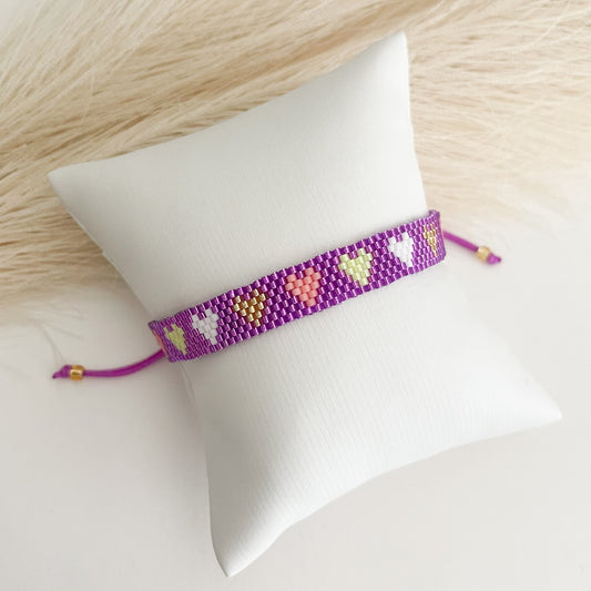 Purple bracelet with colors hearts